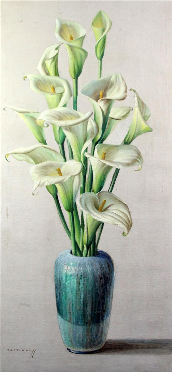 Vladimir Tretchikoff (Russian, 1913-2006) Still life of Arum Lilies in a blue vase 48 x 23in., unframed